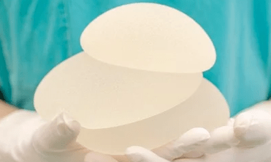 Mga implant sa Breast alang sa Bust Pagdugang